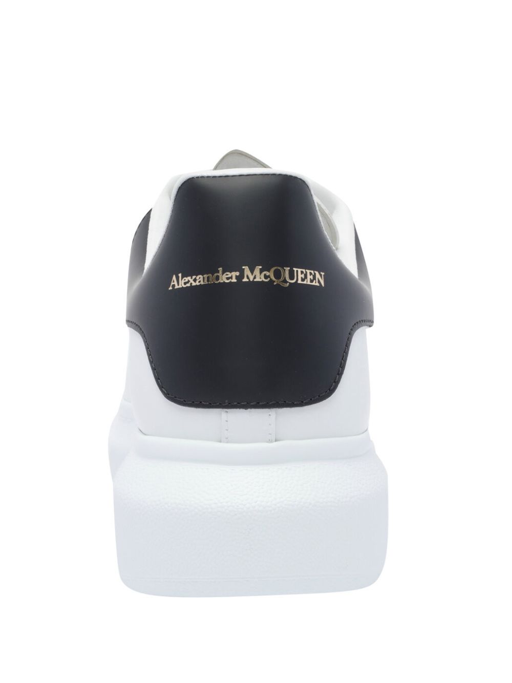 ALEXANDER McQUEEN Sneakers bianche con linguetta sul tallone nera