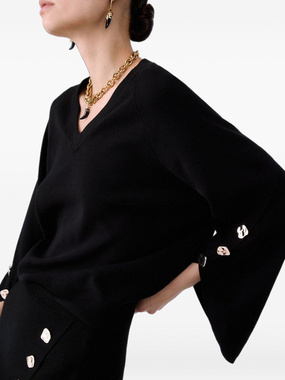 LIUJO Maglia nera con scollo a V e maniche a palloncino