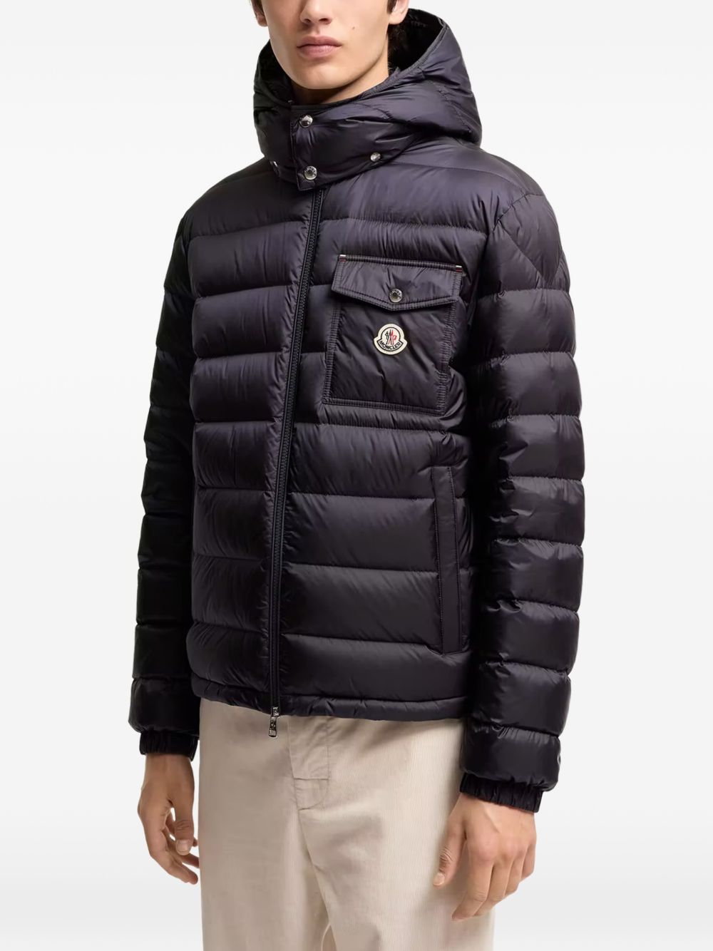 MONCLER Piumino blu Verith con cappuccio e tasche multifunzione
