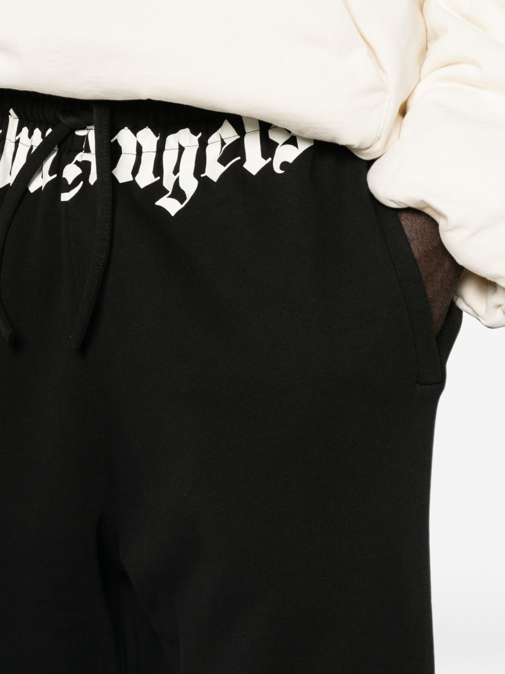 PALM ANGELS Pantaloni della tuta casual neri con logo in vita