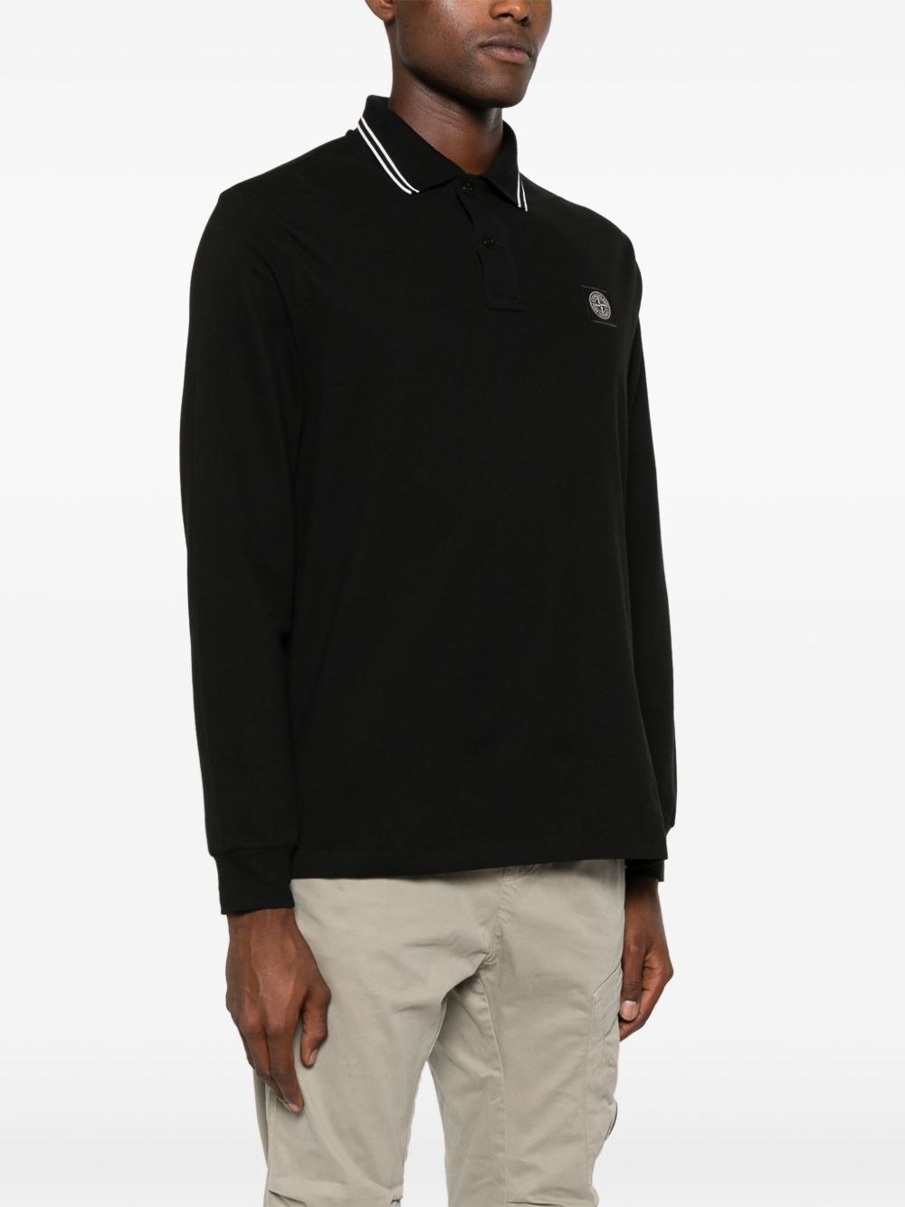 STONE ISLAND Polo nera a maniche lunghe in cotone elasticizzato con dettagli a contrasto