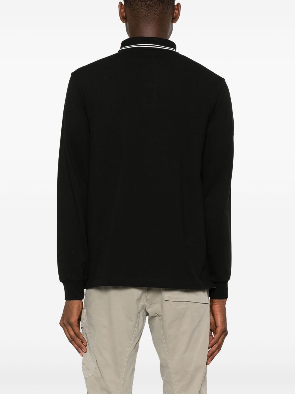 STONE ISLAND Polo nera a maniche lunghe in cotone elasticizzato con dettagli a contrasto