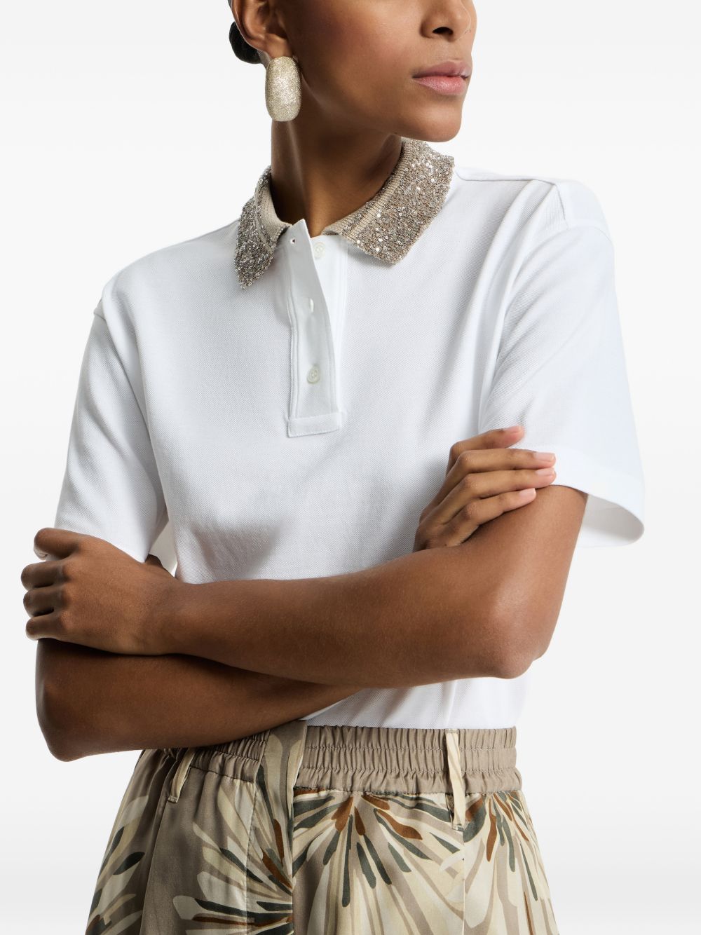 BRUNELLO CUCINELLI Polo in cotone bianco con colletto in maglia e paillettes