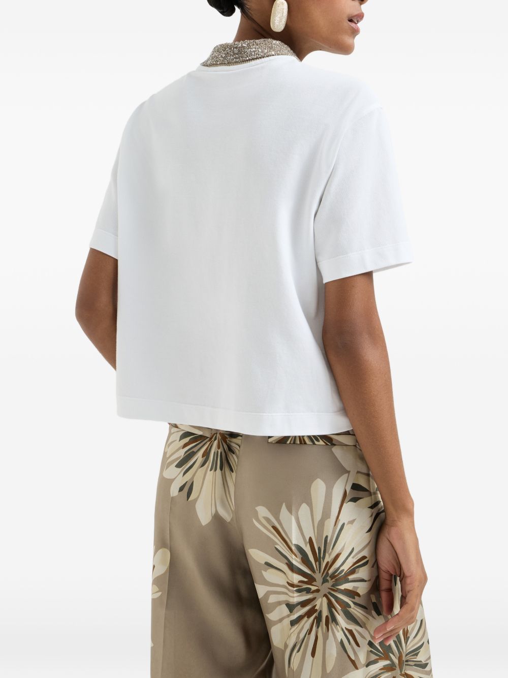 BRUNELLO CUCINELLI Polo in cotone bianco con colletto in maglia e paillettes