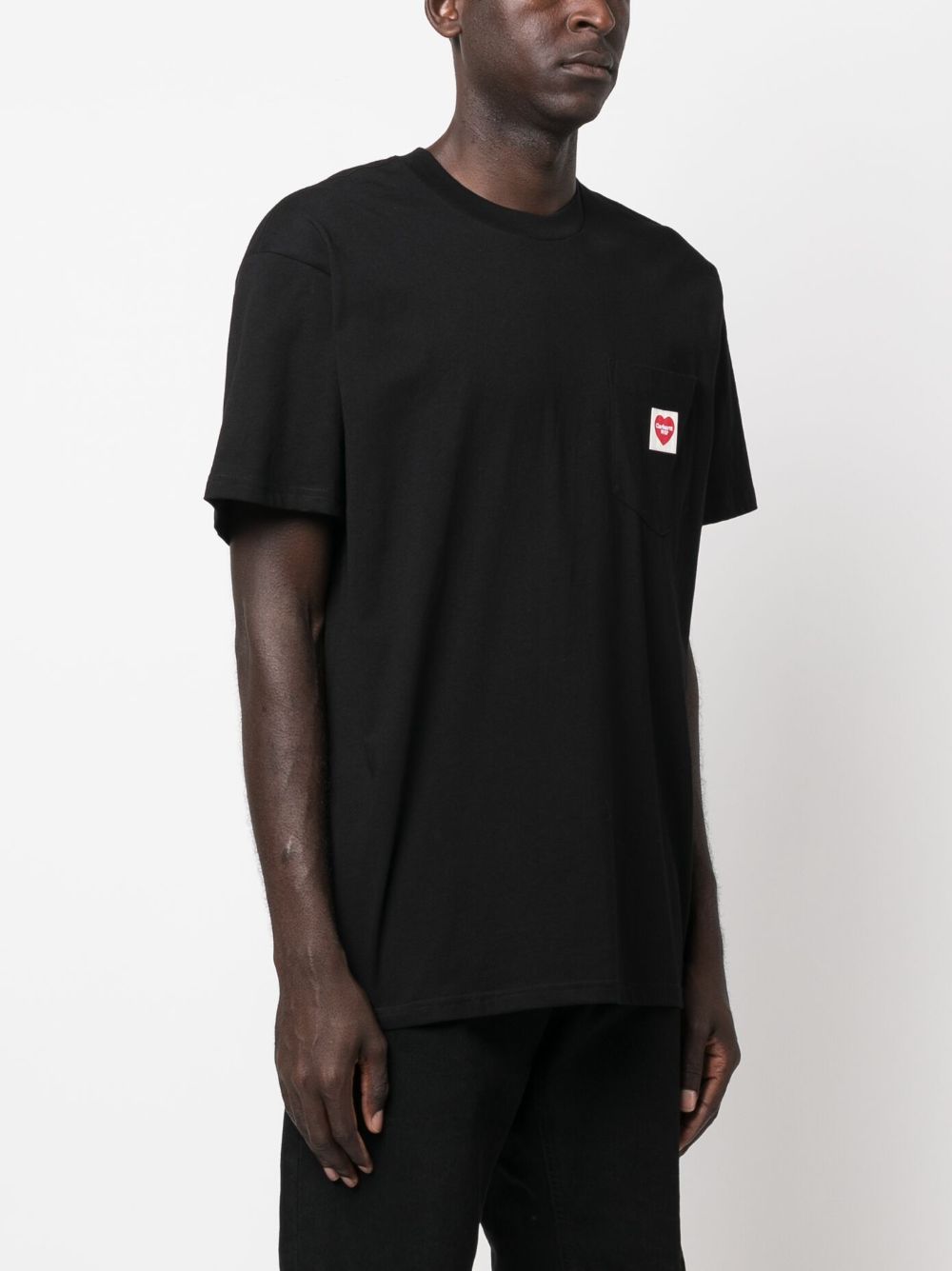 CARHARTT WIP T-shirt nera con logo cuore sul petto