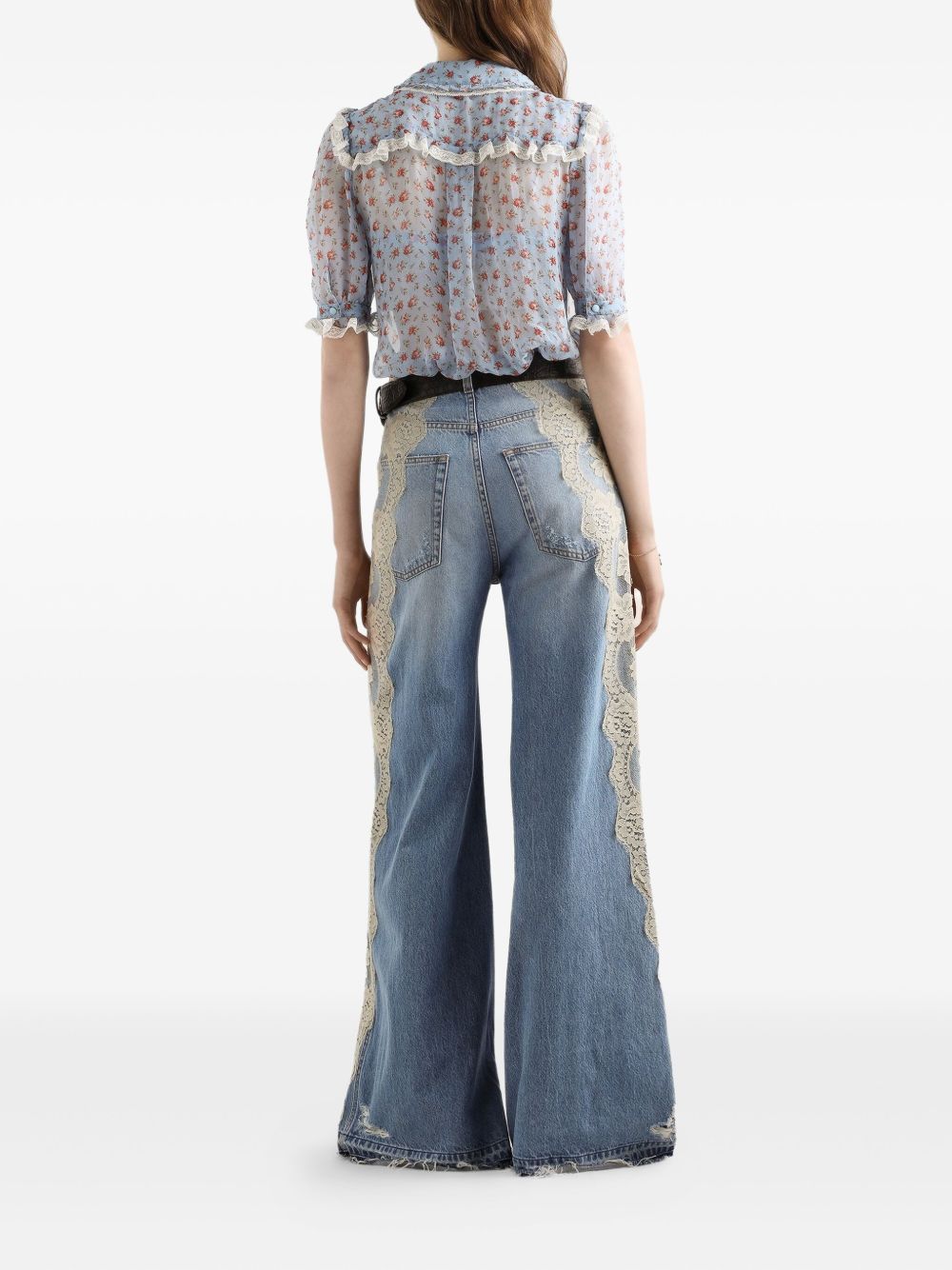 DOLCE e GABBANA Jeans lunghi con strappo e pizzo bianco