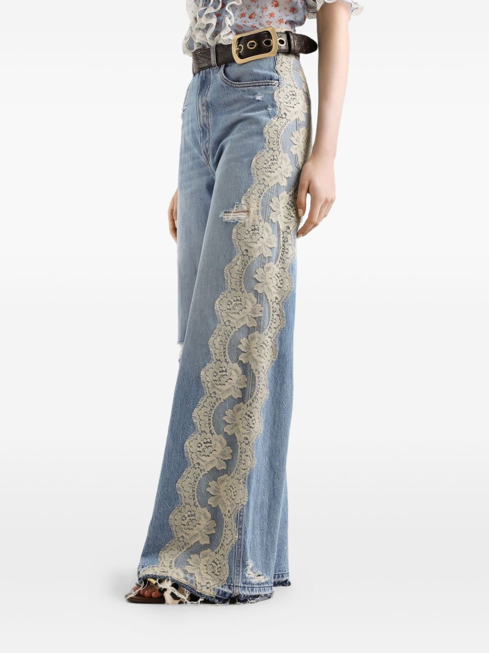 DOLCE e GABBANA Jeans lunghi con strappo e pizzo bianco