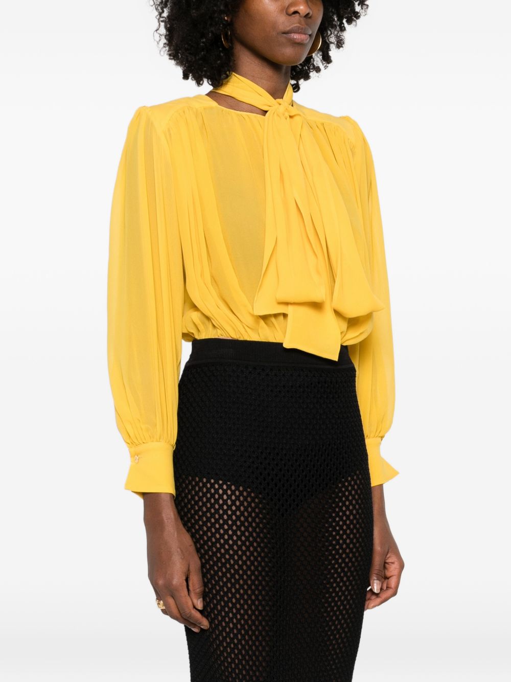 ELISABETTA FRANCHI Body in seta giallo sole con dettaglio plissettato e fiocco al collo