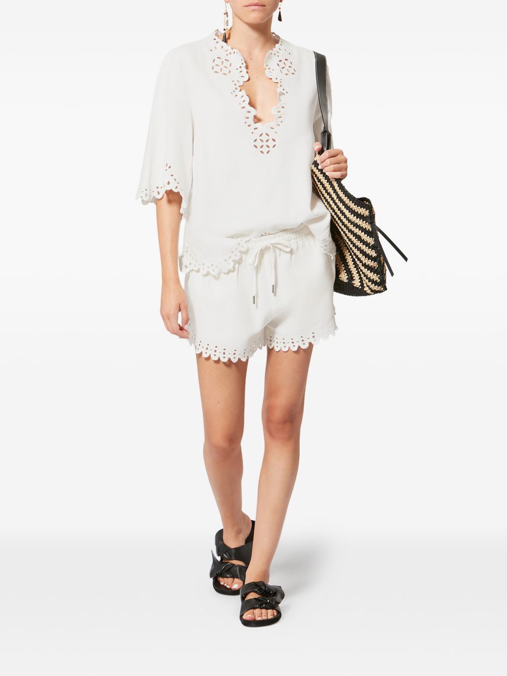 MARANT ETOILE Blusa bianca a maniche corte con scollo a V e orlo smerlato