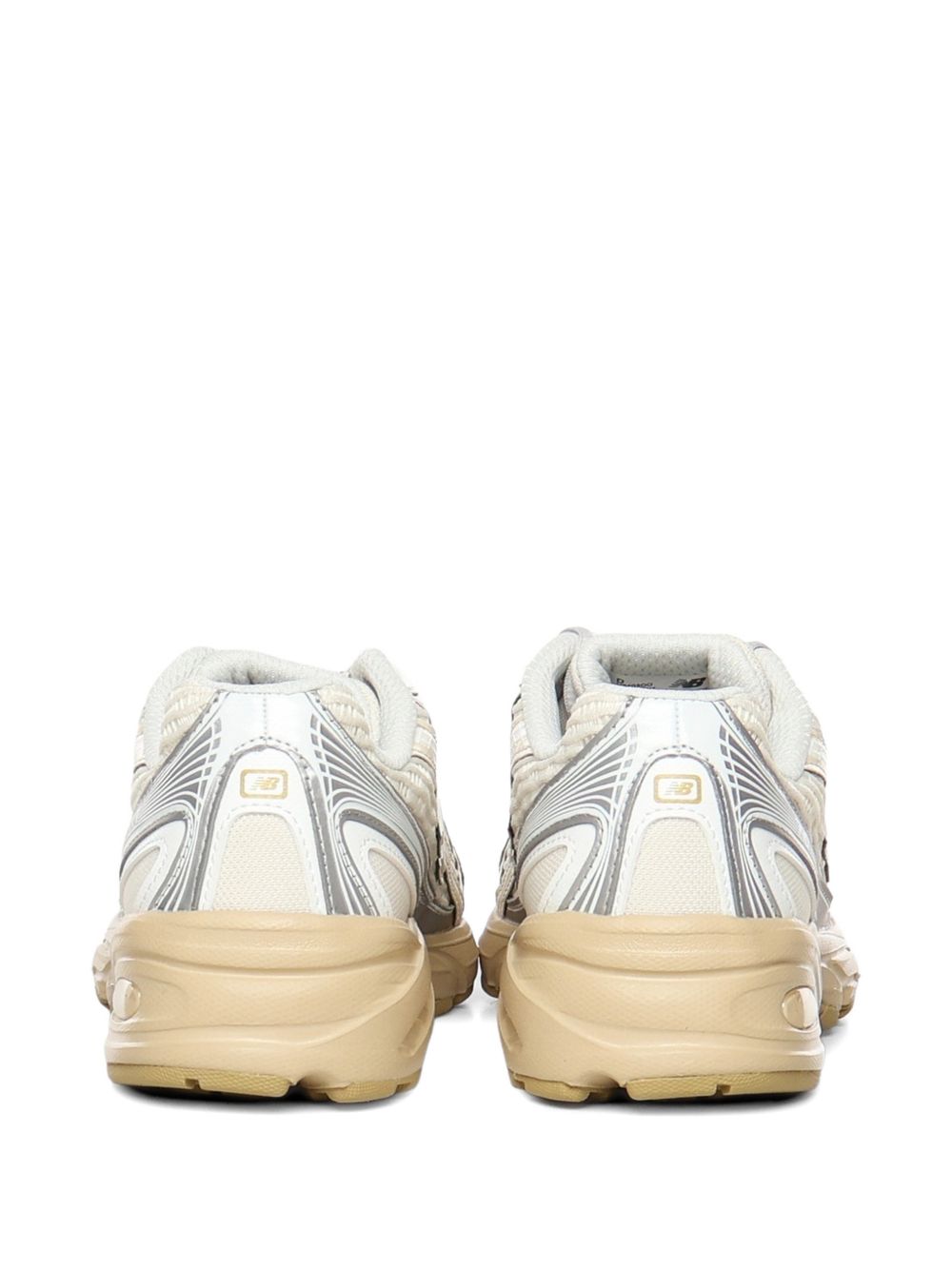 NEW BALANCE Senakers 740 bianche e argento