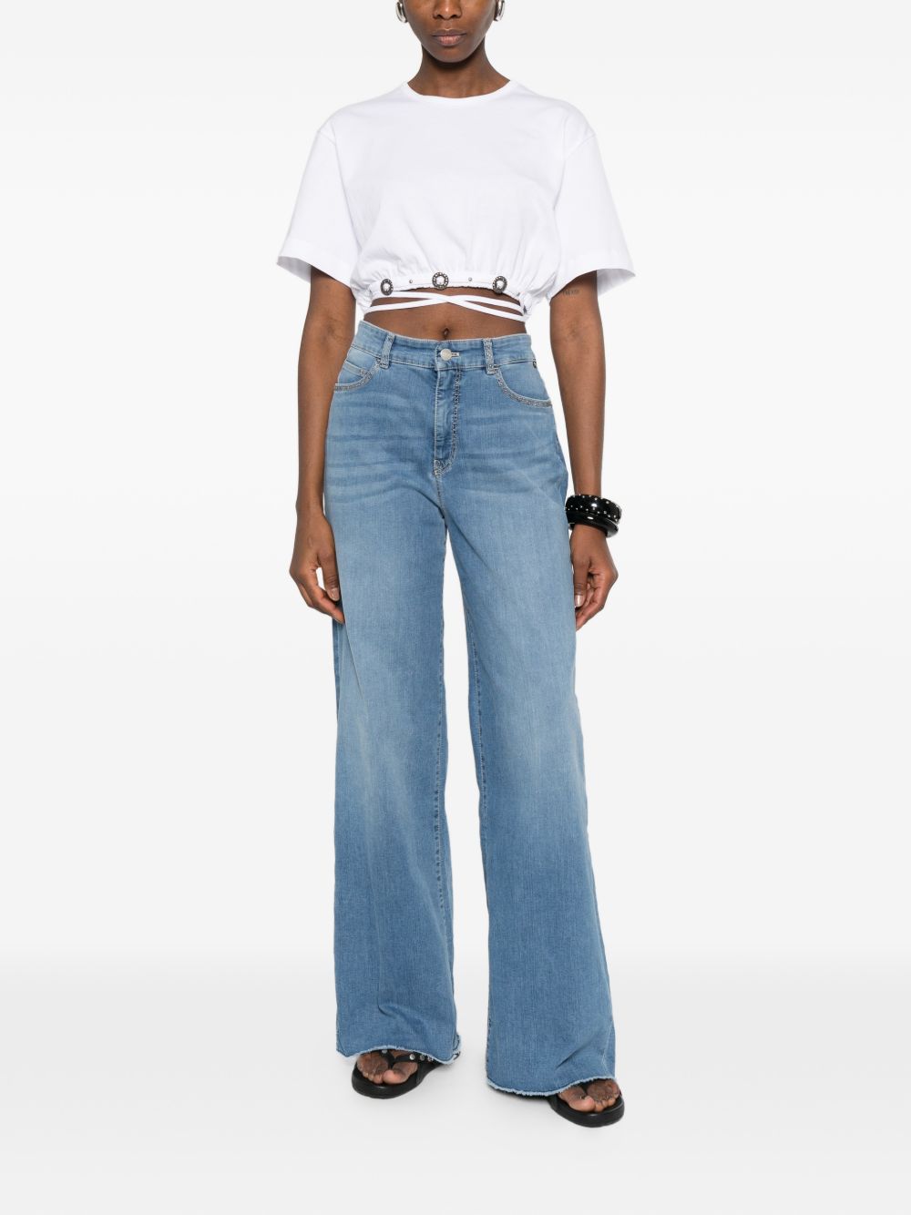 PINKO Top bianco con borchie e lacci