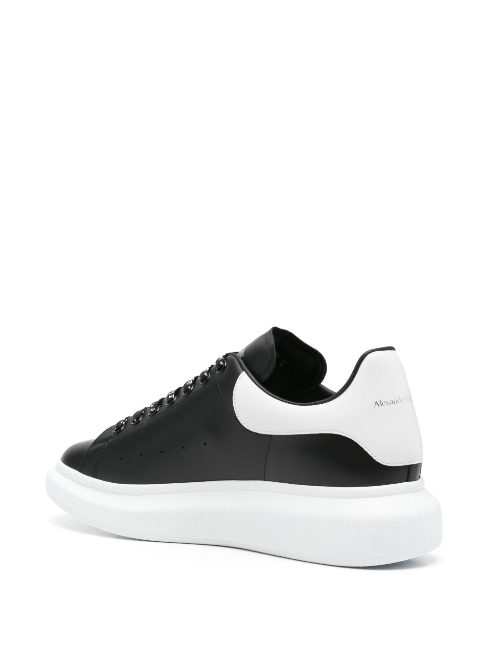 ALEXANDER McQUEEN Sneakers nere con suola e linguetta sul tallone bianca 