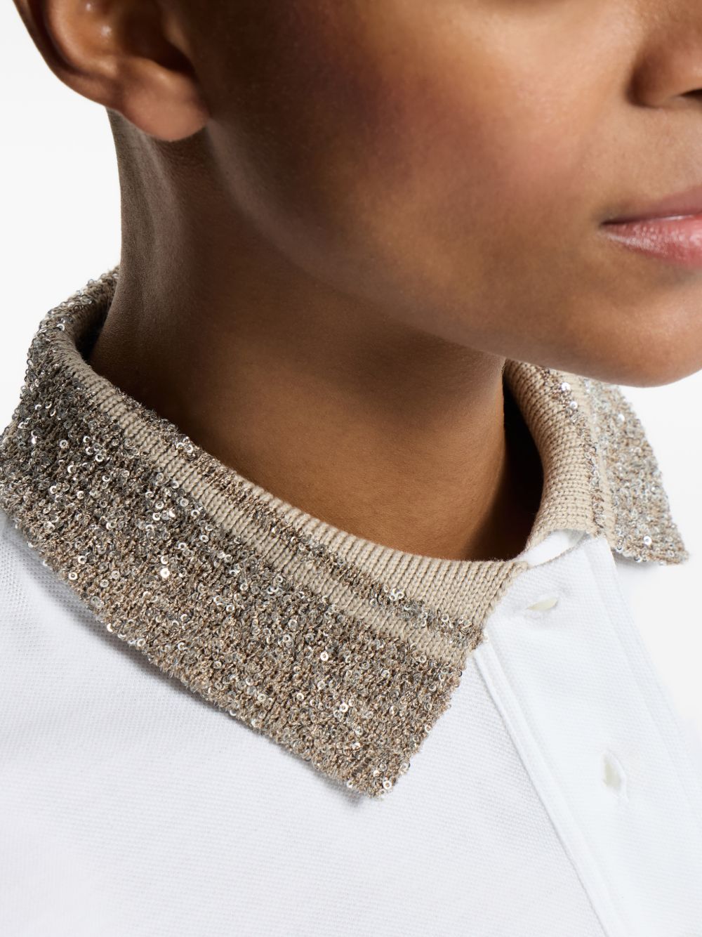 BRUNELLO CUCINELLI Polo in cotone bianco con colletto in maglia e paillettes 
