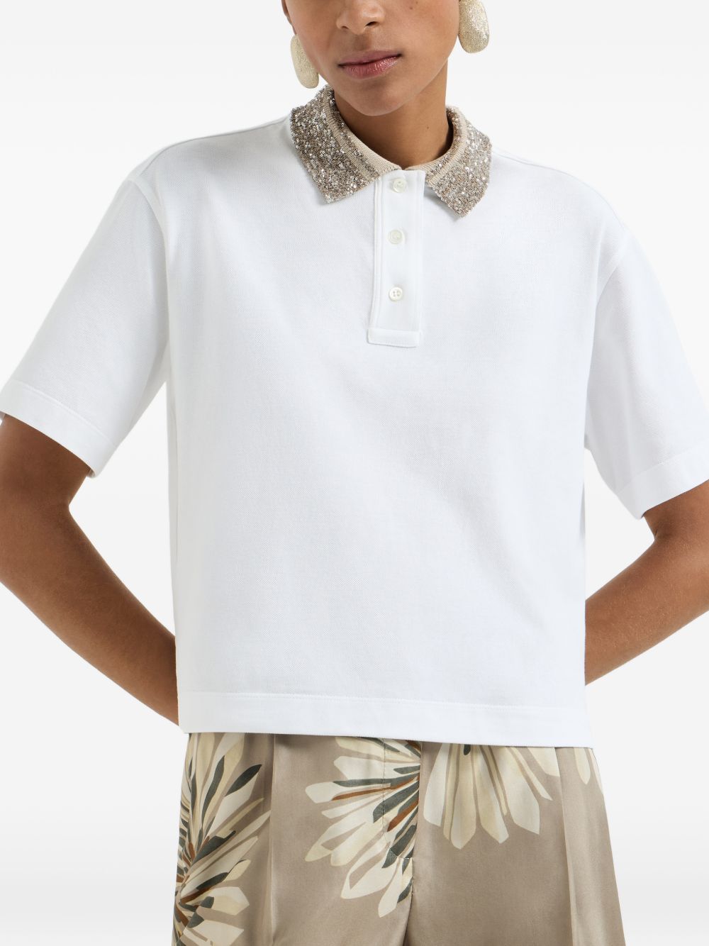 BRUNELLO CUCINELLI Polo in cotone bianco con colletto in maglia e paillettes 