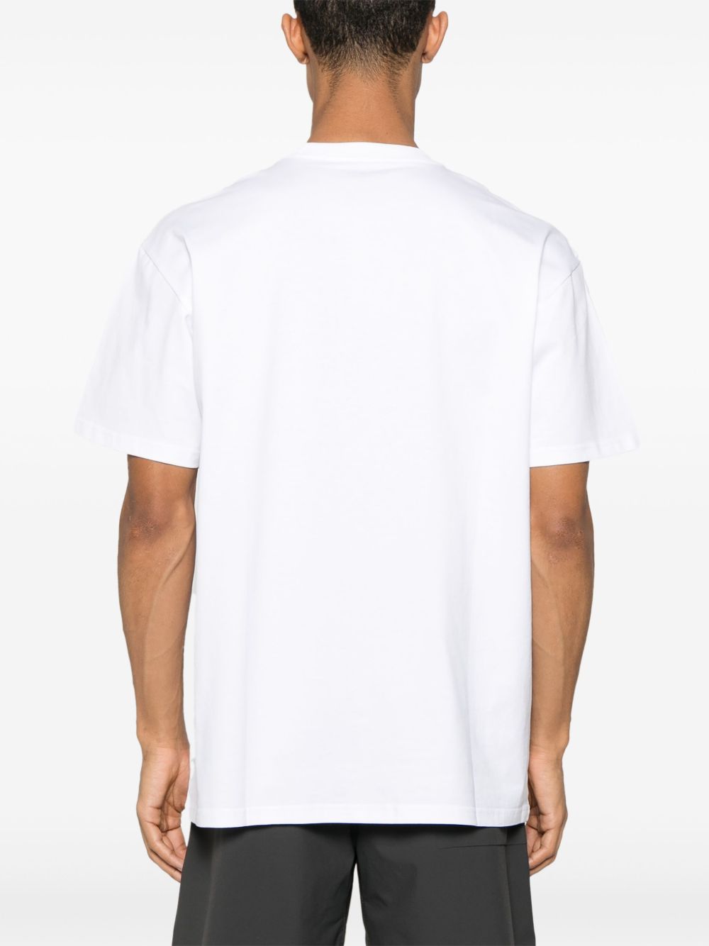 CARHARTT WIP T-Shirt 'Chase' girocollo in cotone bianco con logo 