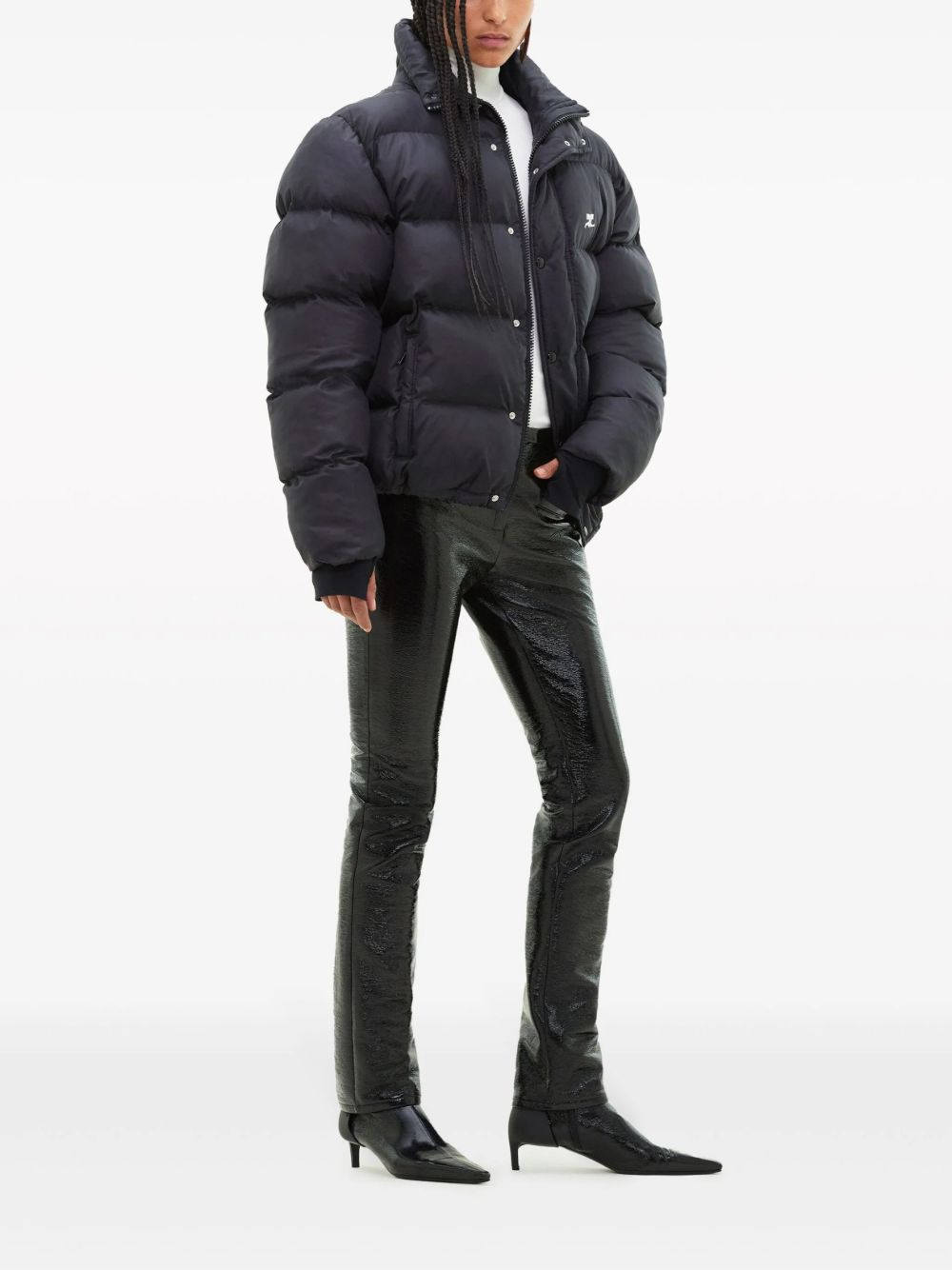 COURREGES Piumino nero con coulisse in vita e tasche laterali 