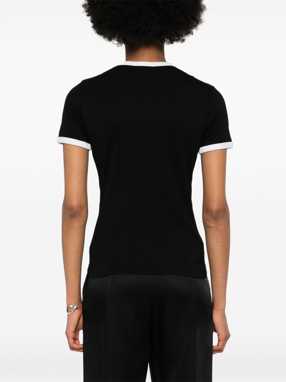 COURREGES T-shirt slim nera con rifiniture bianche 