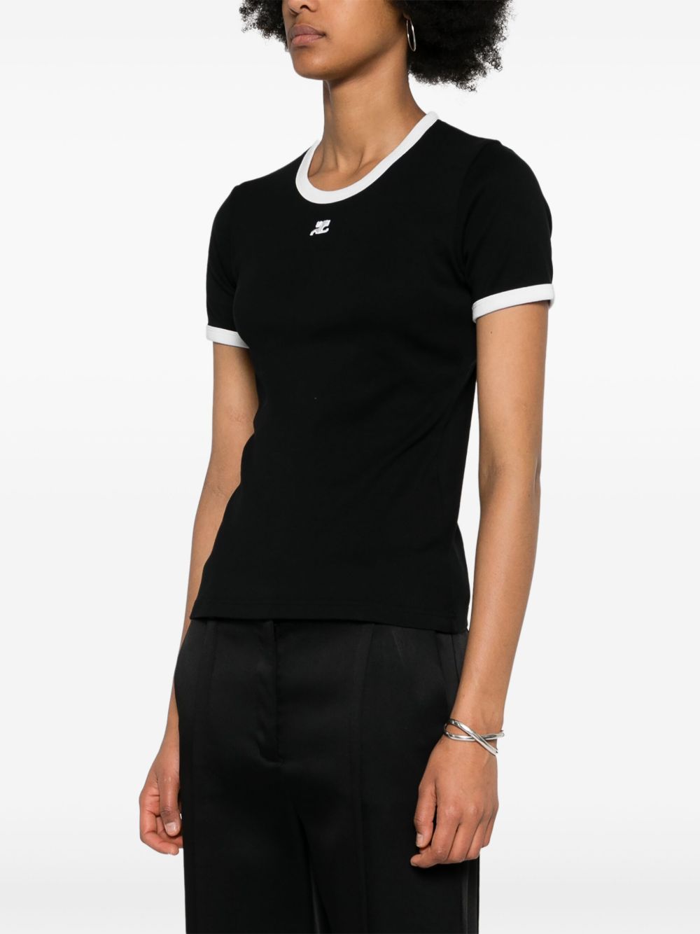 COURREGES T-shirt slim nera con rifiniture bianche 